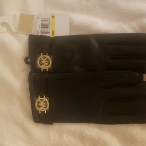 Michael Kors leather gloves. Black. Gold charms. Size M. Brand new never worn.